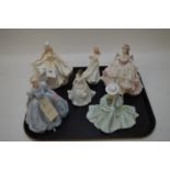 Porcelain figurines by Coalport, Royal Worcester and Royal Doulton.