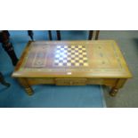 A 20th Century Indian inlaid games/coffee table, the rectangular top inlaid with checkerboard