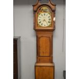 R Cairns: an oak and mahogany banded longcase clock, 19th Century, the painted and arched dial, with