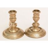 A pair of silver candlesticks