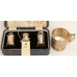 A silver christening cup and an EPNS condiment set