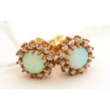 A pair of opal and diamond cluster earrings