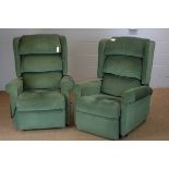 Pair of green electric reclining armchairs.