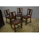 Set of four dining chairs.