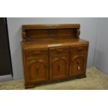 A 1930's oak sideboard.