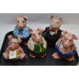 A set of six Wade Nat West Pig money banks, 14-18cms high. (5)