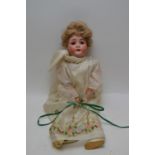 Early 20th Century German porcelain head doll.