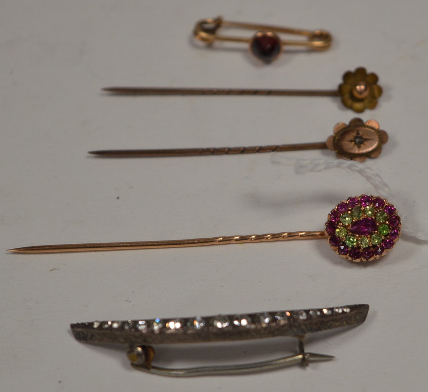 Tie pins and brooches