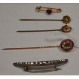 Tie pins and brooches