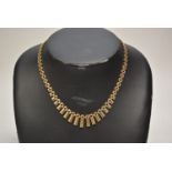 A 9ct gold fringe necklace