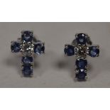 A pair of sapphire and diamond cross pattern earrings