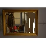 Rectangular bevelled wall mirror.