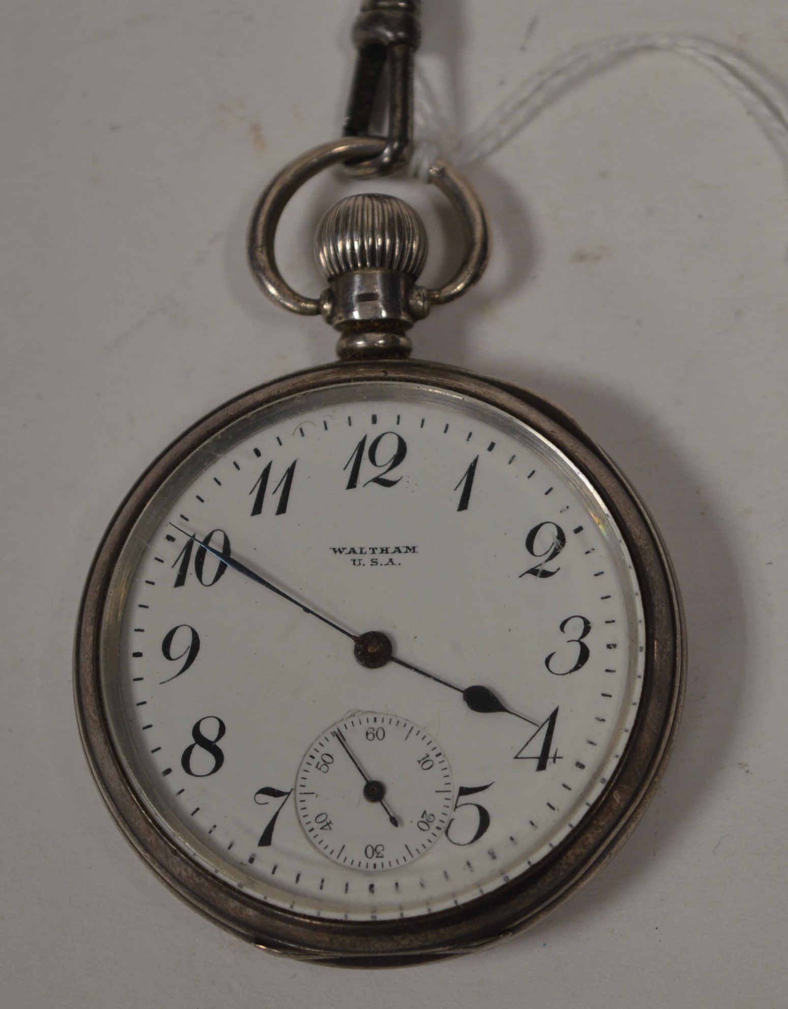 Silver cased open faced pocket watch by Waltham