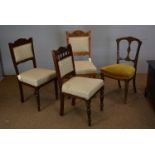 Four dining chairs.