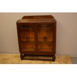 A 1930's oak display bookcase.