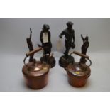 Two copper kettles; and two pairs of spelter figures.