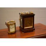 A mantel clock; and a carriage clock.