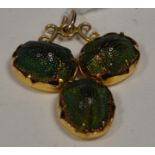 Scarab beetle brooch