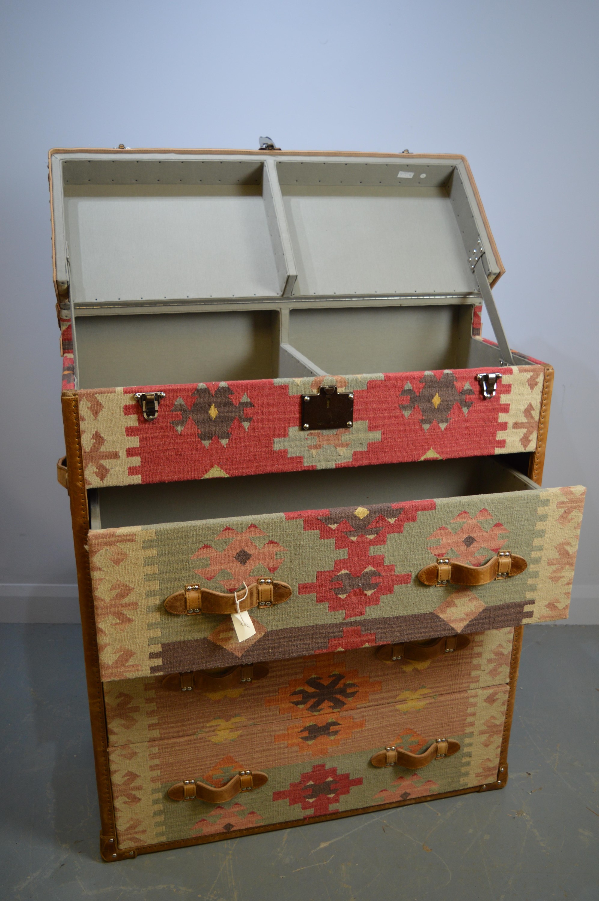 A Kelim covered chest of drawers by Andrew Martin