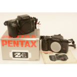 Two Pentax cameras.