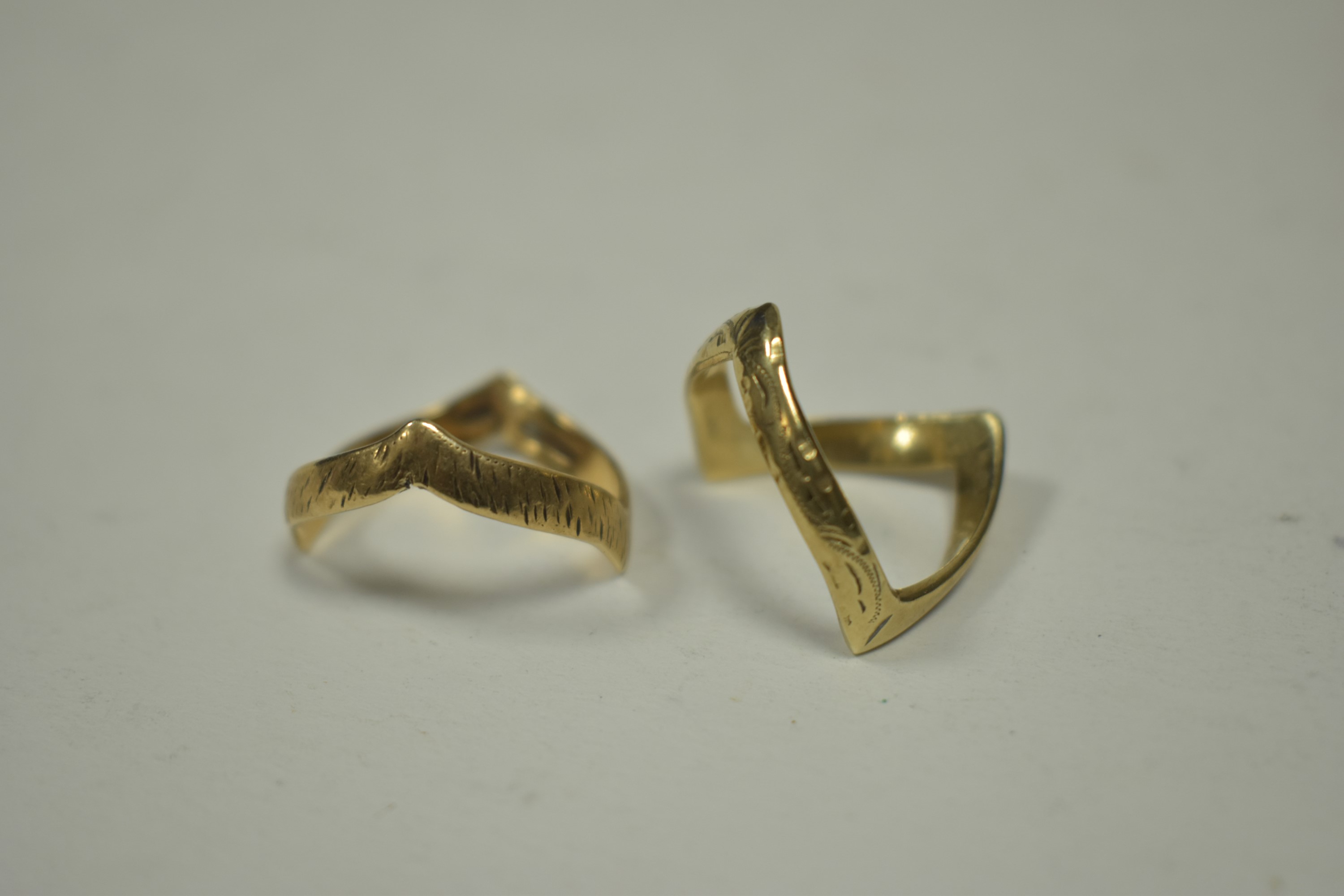 Two 9ct gold wishbone pattern rings