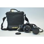 A Minolta Dynax 500si 35mm SLR camera; with Minolta 28-80mm f4-5.6 AF lens, and Sirius 70-210mm f4-