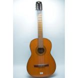 An Antoria classical acoustic guitar.