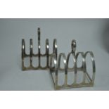 A pair of silver toast racks