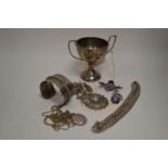 Silver jewellery and trophy