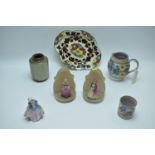 Poole and Doulton pottery items.
