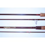 Fuji rod; an Olympic rod, both in slips. / Assorted fishing equipment.