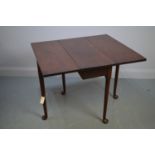 George III style mahogany drop leaf table