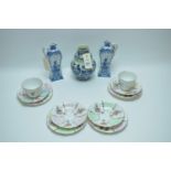 A pair of Delft style porcelain oil bottles; a Delft vase; and a part bone china tea service.