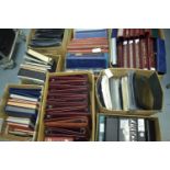 A selection of stamp folders and stock books.