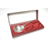 A silver seal top style spoon