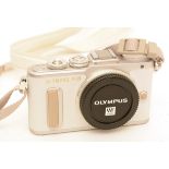 Olympus Pen E-PL8 in box.