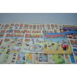 The Beano; and two Beano sticker albums.