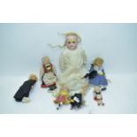 An Armand Marseille doll; and five vintage dolls, various.