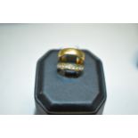 22ct gold ring and an eternity ring