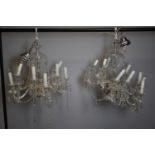 A pair of A 20th Century cut glass ten branch chandeliers