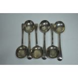 Set of six silver dessert spoons