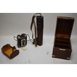 Telescope, Brownie camera; and modern brass-bound box.