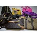 Assorted lady's designer and other bags.