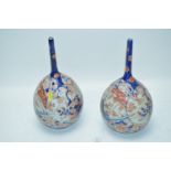 Pair of Japanese Imari bottle vases.