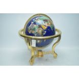Large globe on stand.