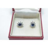 A pair of sapphire and diamond cluster earrings