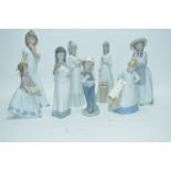 Eight ceramic figurines.