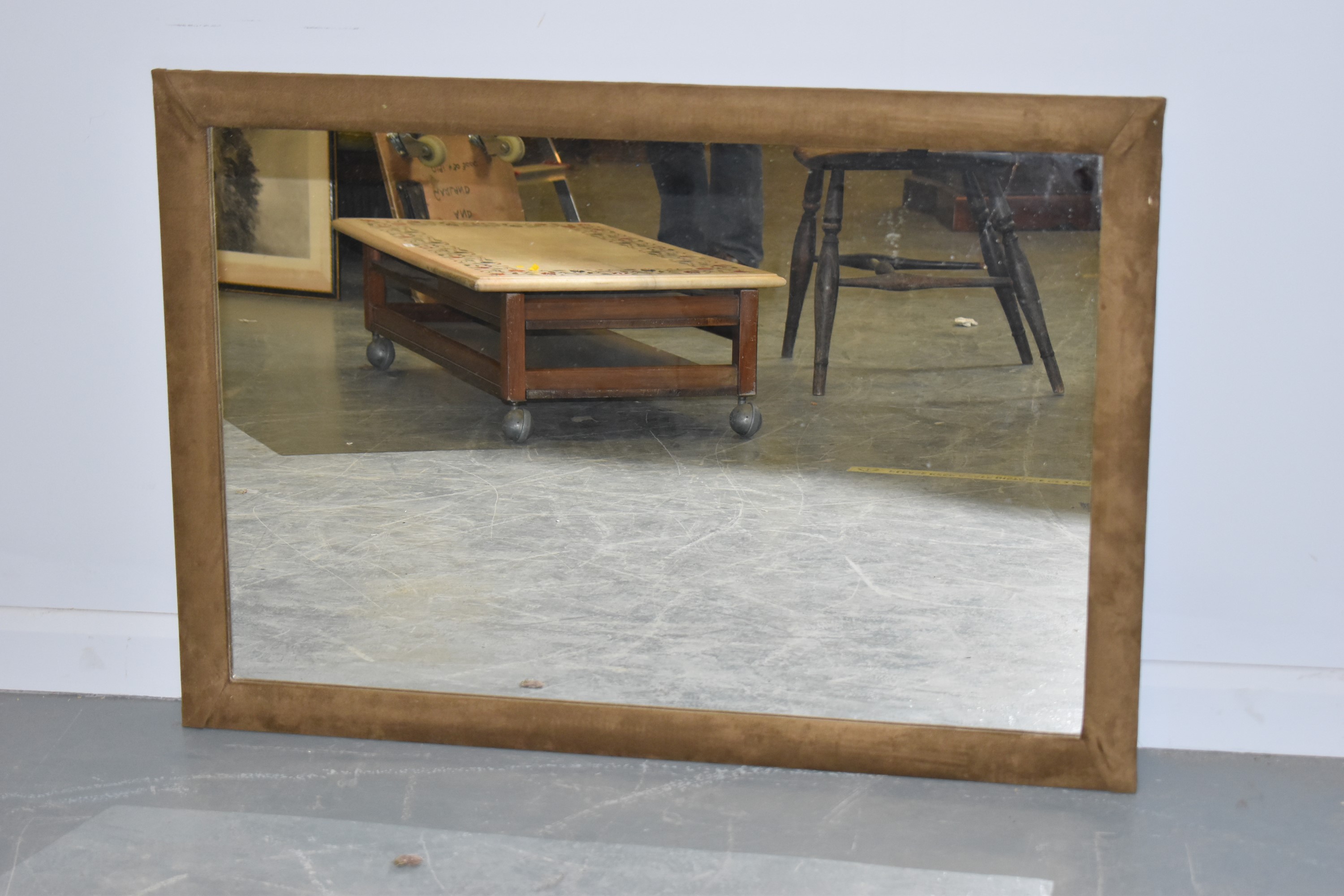 20th Century suede covered wall mirror