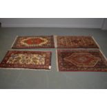 Four modern prayer rugs