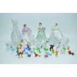 Three Royal Doulton figurines; glass animal figures; and other glass items.